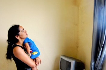 Patrícia dos Santos in her Campo Grande apartment. Photo by Catherine Osborn